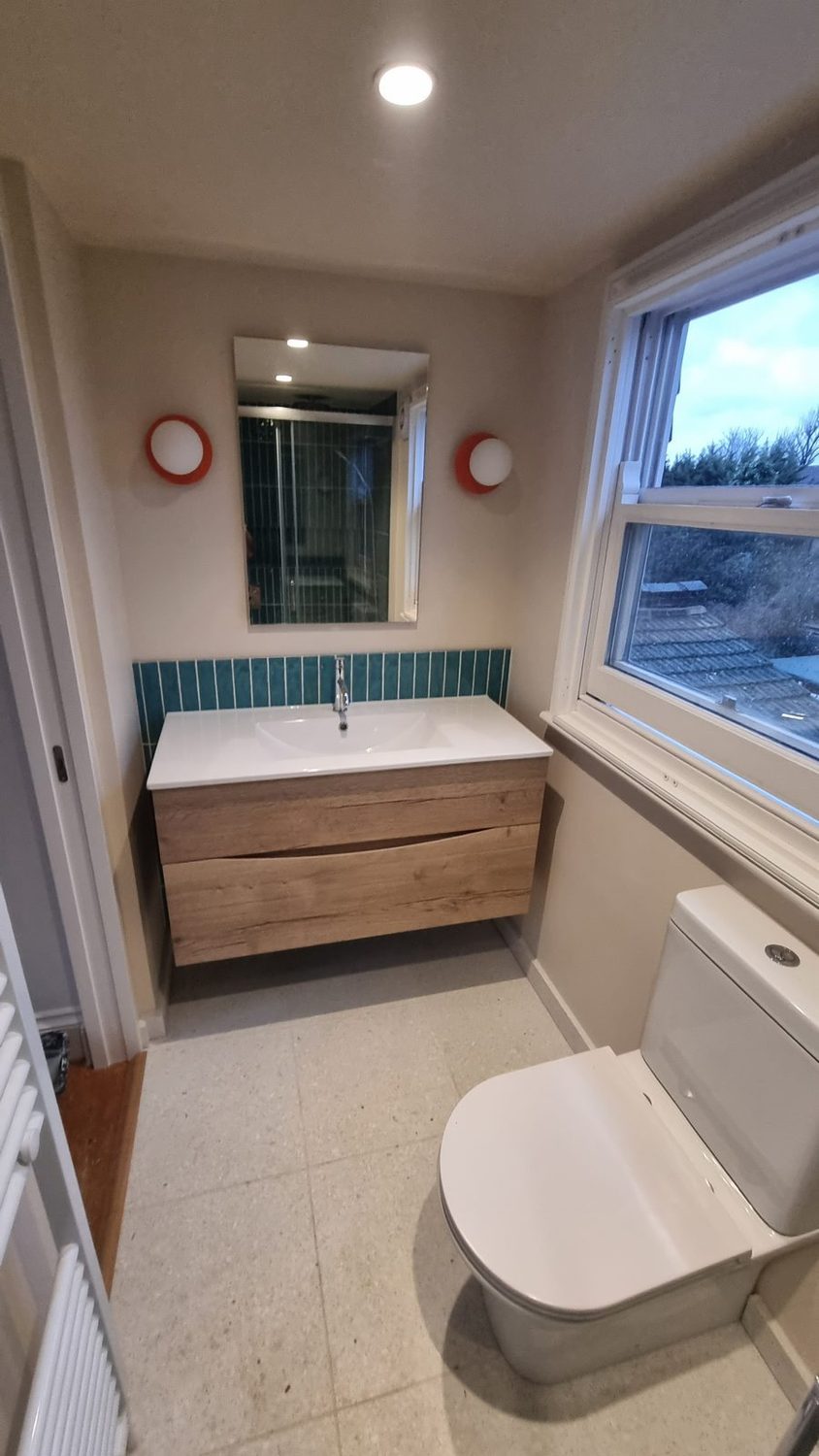 Finished bathroom by JAG Construction